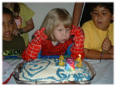 Gracie_blowing_candles.JPG